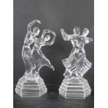 A pair of decorative glass daner figurin