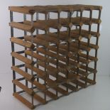 A wooden and metal wine rack.