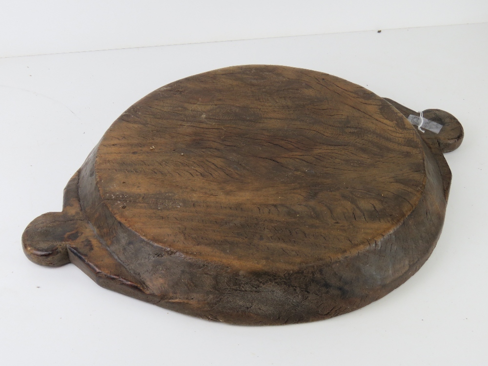 A hand carved wooden tray having lug handles, 53.5cm widest. - Image 2 of 2