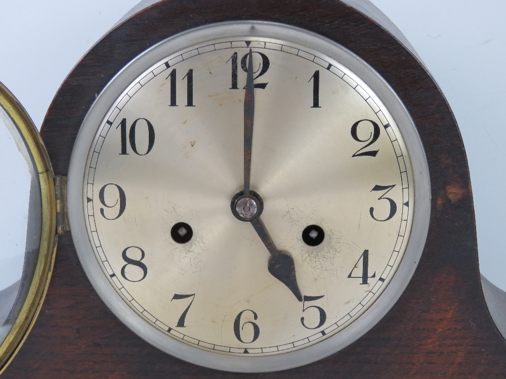 A c1930 oak cased mantel clock with winging key. - Image 2 of 5