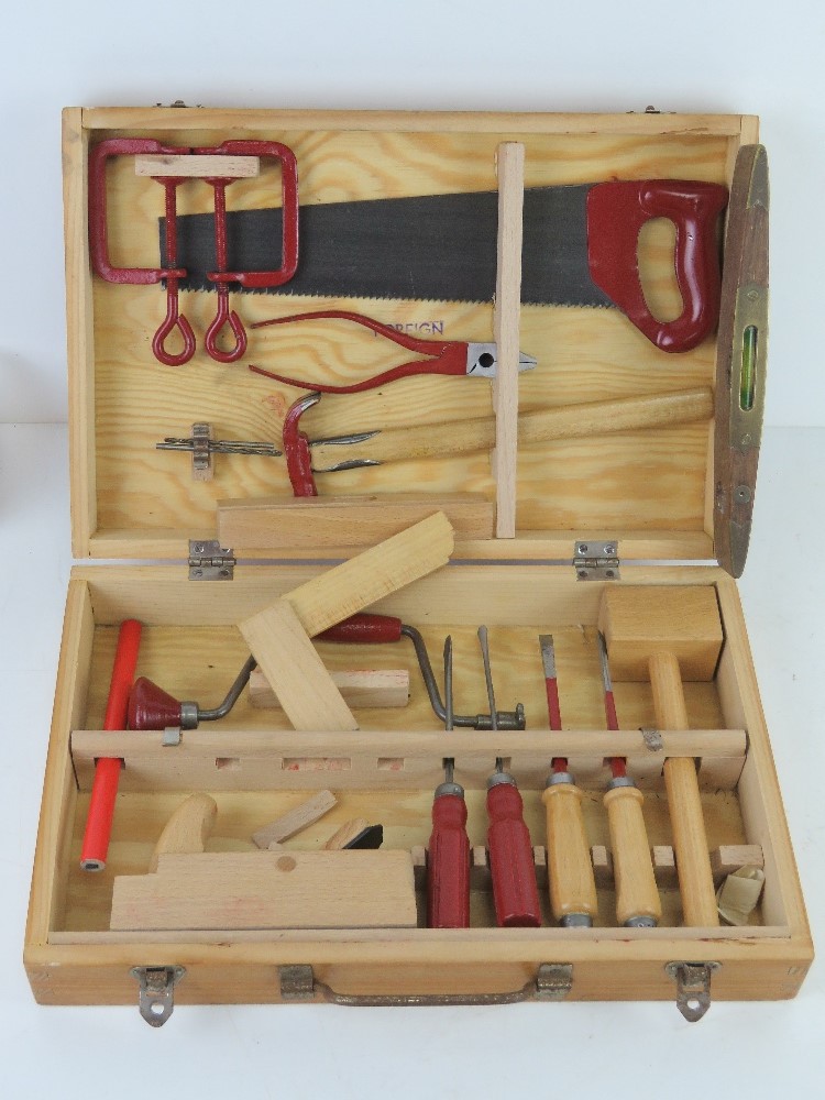 A tool set including spanners, plane, chisels, saw hand drill etc by Krakpol.