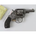 A deactivated Harrington & Richardson American Model .38 S&W Calibre Five Shot Revolver.