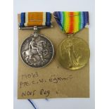 A WWI War and Victory medal pair for 19063 Pte. C.W. Egmorf, Norfolk Regiment.