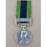 An India General Service Medal Clasp Waziristan 1919-21 for 5764599 Pte. W. Woods 2 Bn.