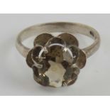 A hallmarked silver smoky quartz ring, the oval cut stone measuring approx 10 x 7.