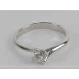 A platinum and diamond solitaire ring with certificate,