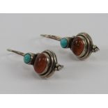 A pair of silver Native American style carnelian and turquoise earrings, stamped 925, 3cm drop.