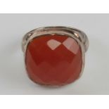 A silver and carnelian ring faceted cabachon approx 16 x 16mm, stamped 925, size P.