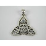 A silver Wiccan pentagram, crescent and moonstone pendant, stamped 925 and measuring 2.7cm wide.