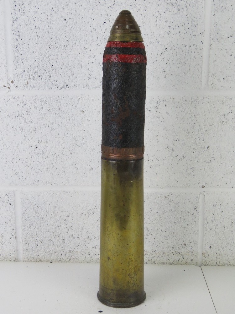 An inert WWI British 18pr shell, the hea