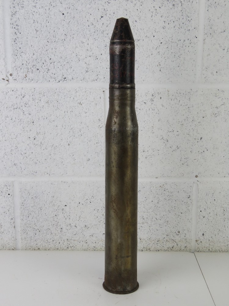 An inert WWII German 5cm Pak shell, stru