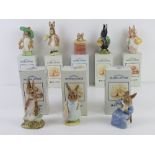 Royal Albert Beatrix Potter; eight figurines with associated boxes being 'Mrs Rabbit',