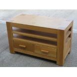 A contemporary oak table having two drawers, 50 x 100 x 60.5cm.