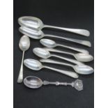 A quantity of silver spoons including set of five HM silver teaspoons, single sterling silver spoon,