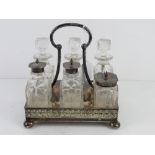 A silver plated and cut glass cruet, 19.5cm wide.