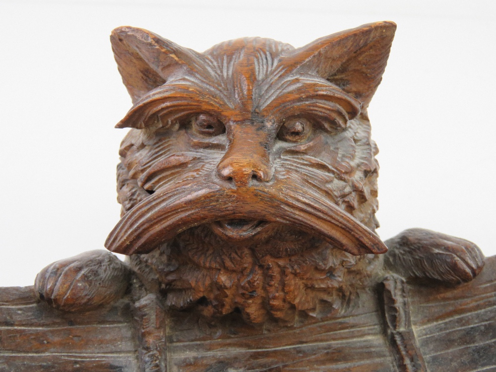 A black forest type carved wooden pen tray having beast peering over side of boat, - Image 7 of 7