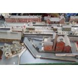 A quantity of model railway diorama makers buildings and part build diaramas including street
