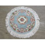 A round woolen rug, 120cm dia.
