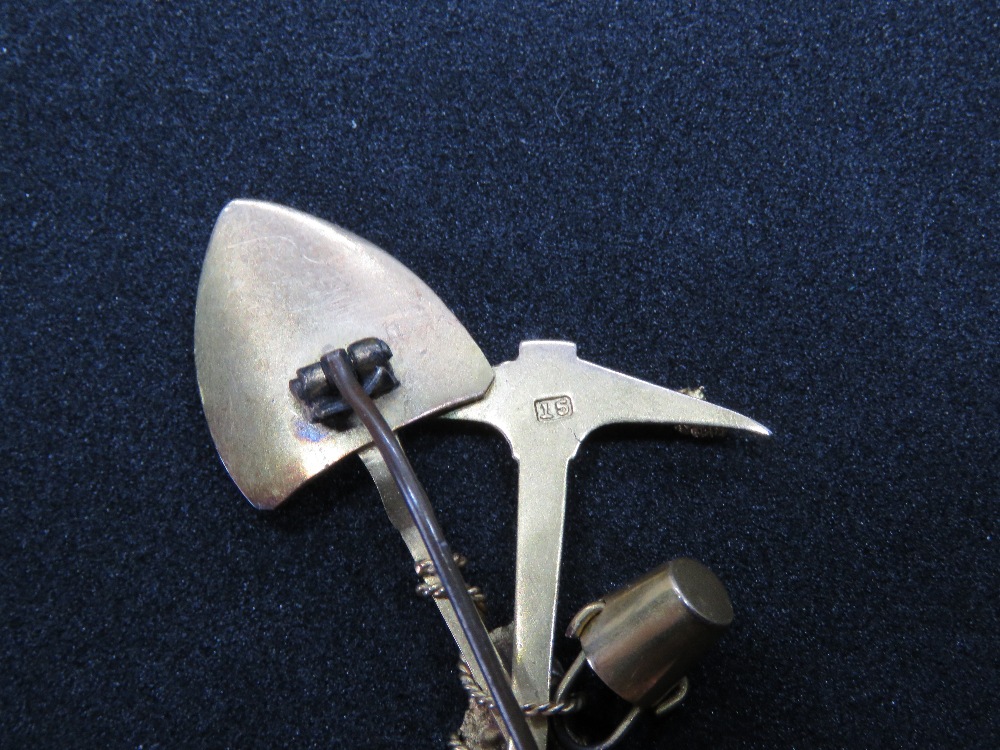 A 15ct gold South Africa mining themed brooch comprising pick, spade and bucket, stamped 15, 7.6g. - Image 2 of 2
