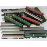 A quantity of model railway wagons and carriages mostly by Triang.