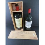 A Chateau St Didier-Parnak 5ltr green glass wine bottle in original box (contents deficient).