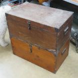 A matched pair of vintage pine storage boxes having metal end handles and corner bracing,