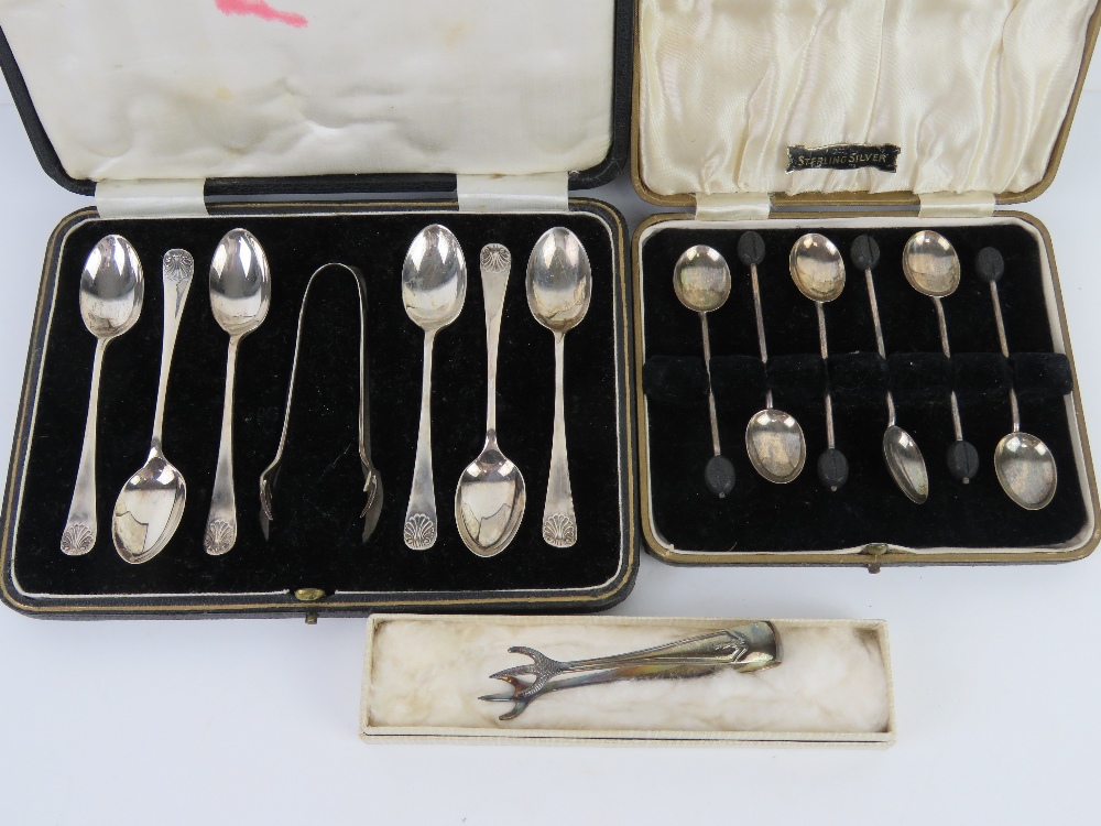 A set of HM silver coffee themed spoons in original fitted box,