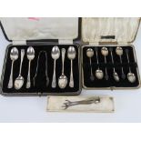 A set of HM silver coffee themed spoons in original fitted box,