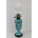 A late 19th century handpainted blue opaline glass oil lamp, burner marked for Hinks Duplex Patent,