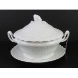 A Limoges large white ground lidded tureen with drip plate under, approx 31cm wide.