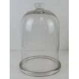 A large glass cloche standing 37cm high, 25cm dia.