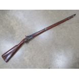 A mid 19th century Indian percussion two band musket with brass butt plate and trigger guard,