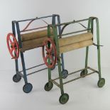 A child's mangle painted blue and having boards and rollers,