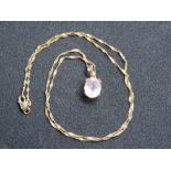 A rose quartz pendant on 9ct gold fancy link chain, pendant stamped indistinctly, chain stamped 375,