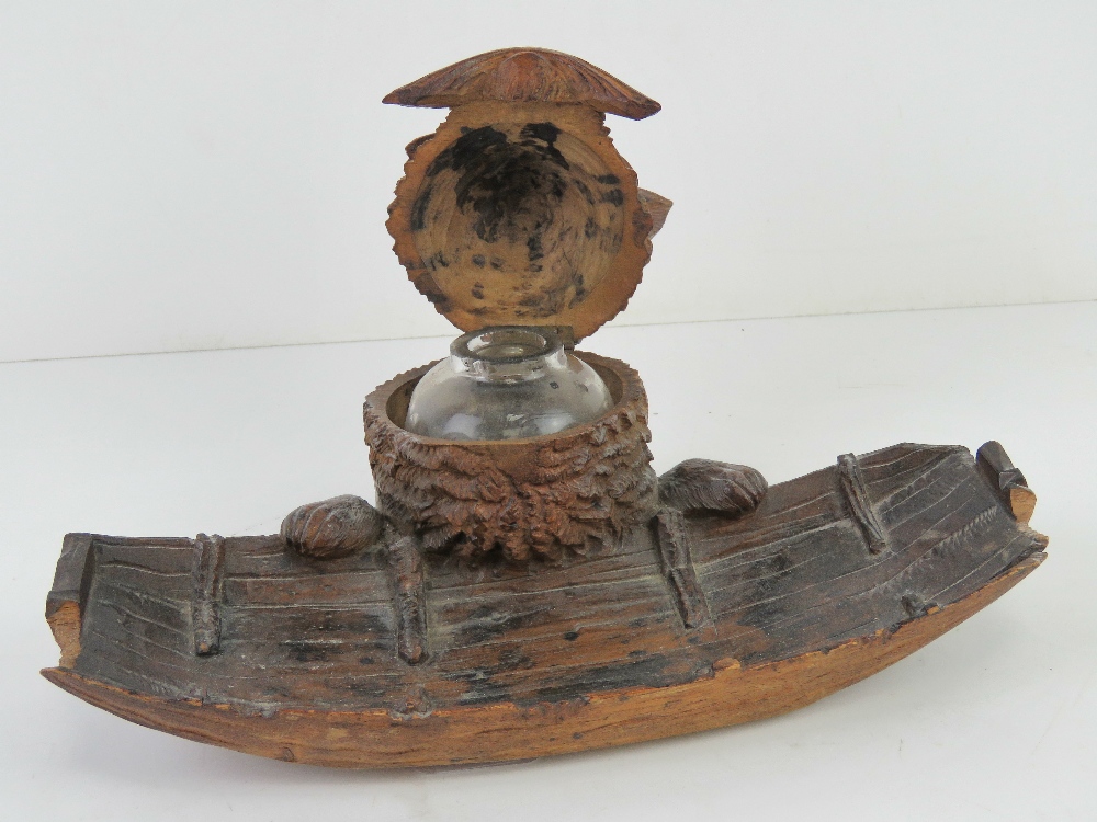 A black forest type carved wooden pen tray having beast peering over side of boat, - Image 2 of 7