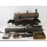 A quantity of model live steam engine components including 5" 2-2-2 bogie with part built