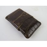 A vintage alligator skin cigar case approx 7 x 13cm.