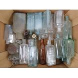 A quantity of vintage glass bottles inc poison bottles, Paterson's bottles,