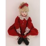 A handmade 20th century bisque headed doll made using an antique doll mould,