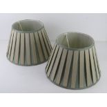 A pair of green and cream silk lamp shades 36cm dia.