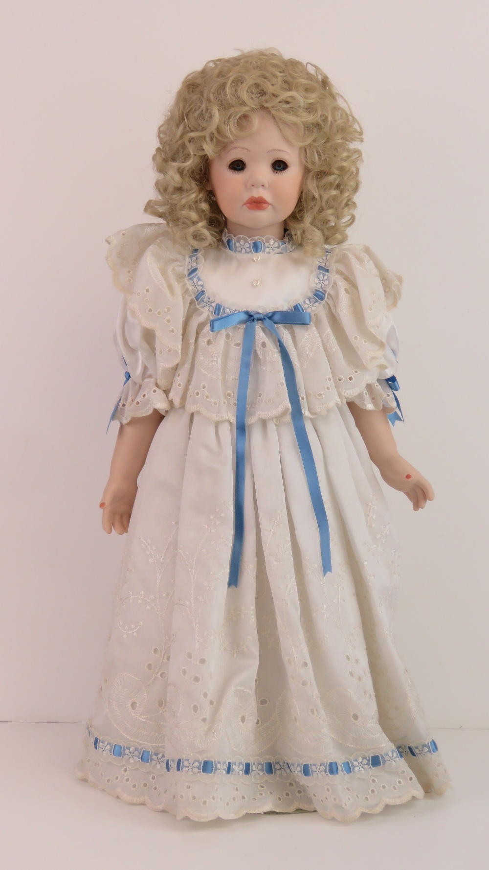 A handmade 20th century bisque headed doll made using an antique doll mould,