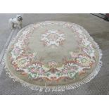 A large oval woolen rug,