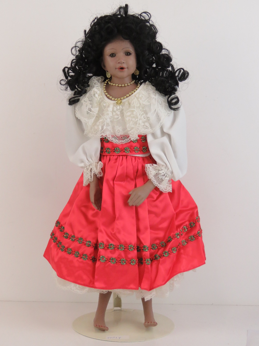 A handmade 20th century bisque headed doll made using an antique doll mould,