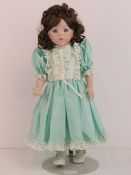 A handmade 20th century bisque headed doll made using an antique doll mould,