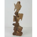 A wooden carving of fish in a 'coral reef', 37cm high.