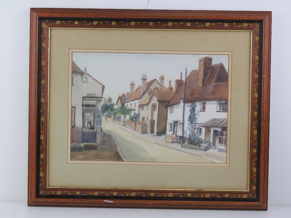 A 20th century Arts and Crafts style handpainted and stained pine frame,