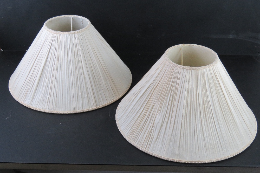 A pair of silk lampshades in cream ground, 41cm dia.