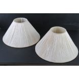 A pair of silk lampshades in cream ground, 41cm dia.