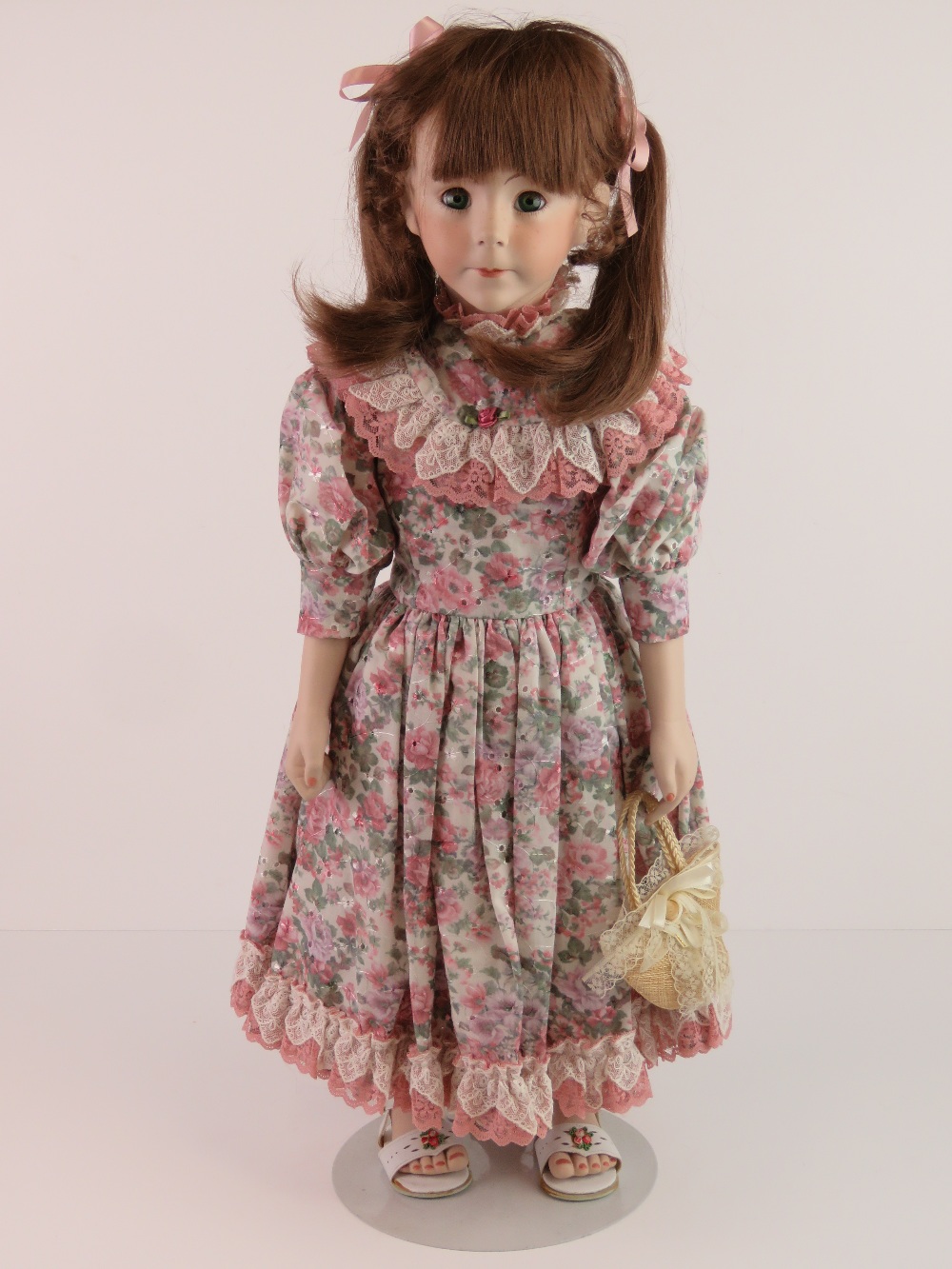 A handmade 20th century bisque headed doll made using an antique doll mould,