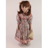 A handmade 20th century bisque headed doll made using an antique doll mould,